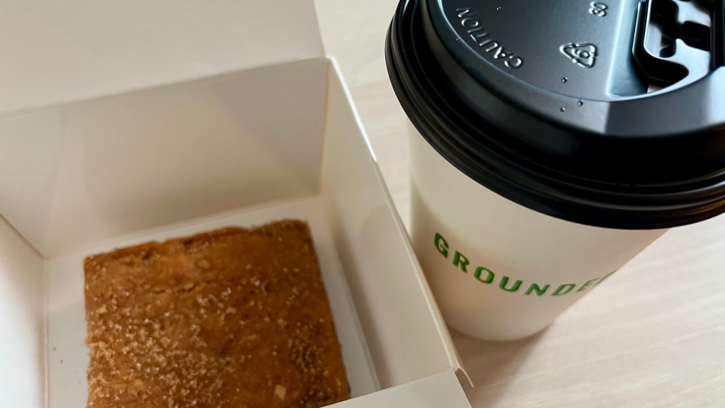 Vegan peanut butter bar with an oat milk latte from Grounded.