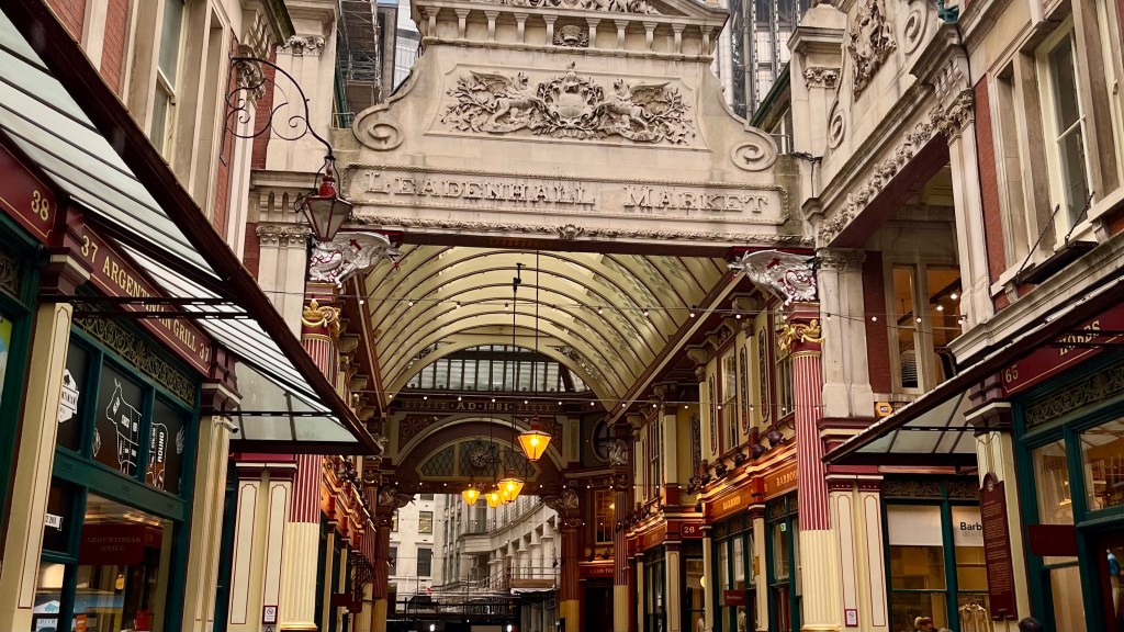the entrance to the market with ornate architecture and lighting
