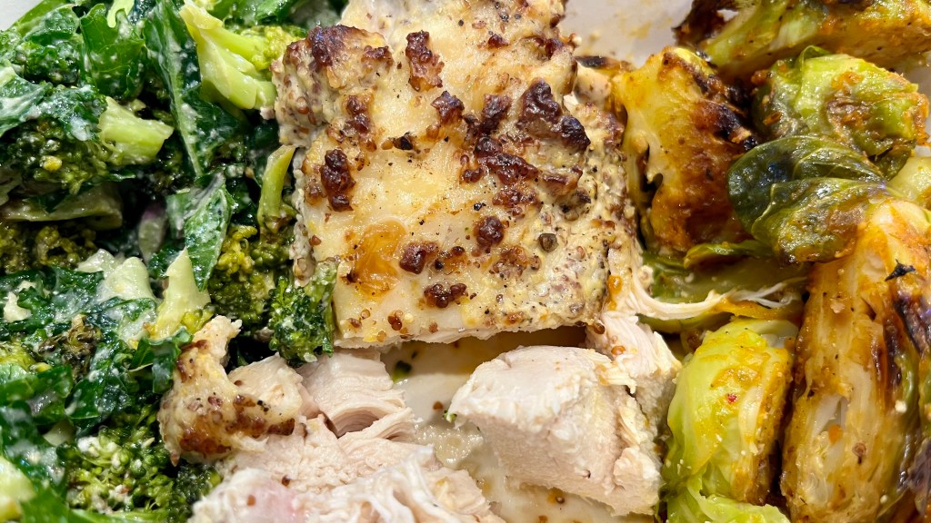 dinner in the SLC airport: kale salad, chicken and brussels sprouts